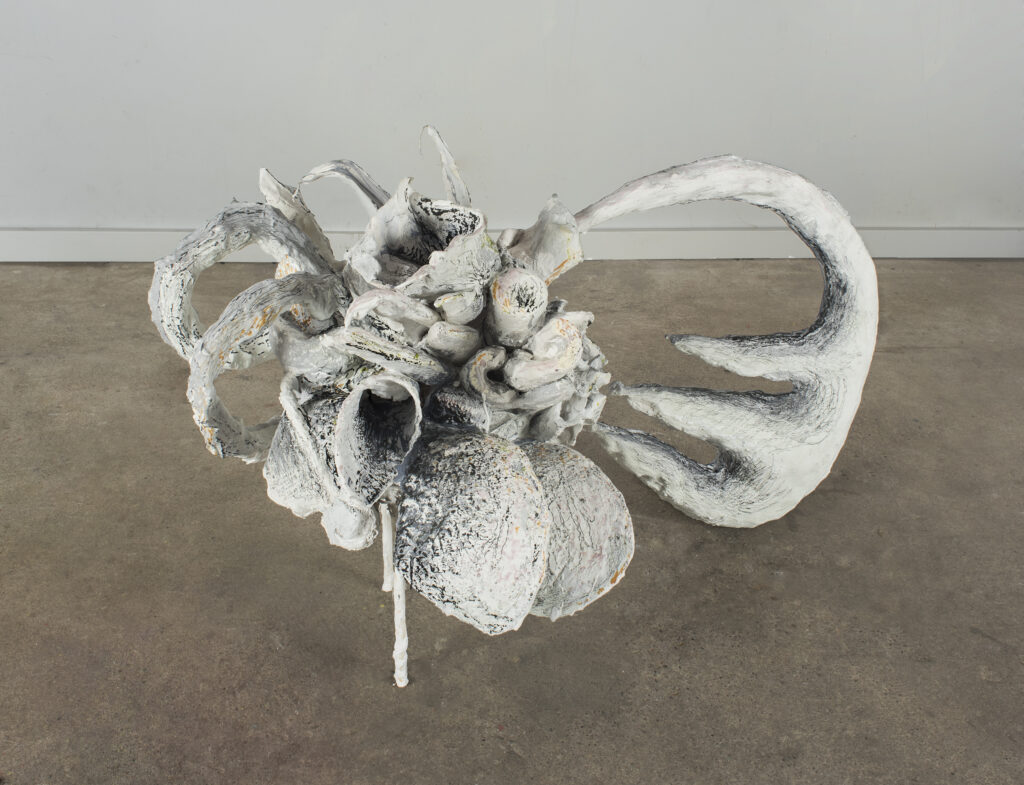 Plaster flower sculpture by artist Carrie Ruddick.